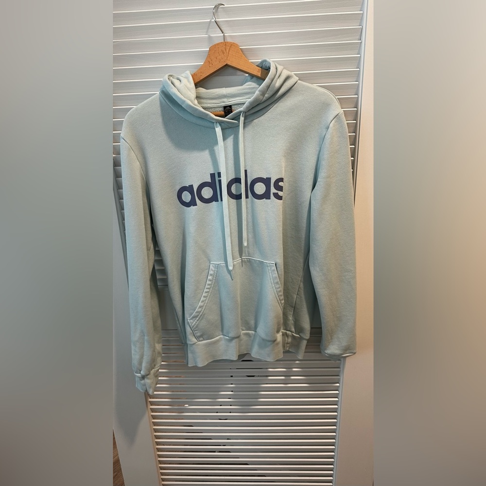 Light blue ADIDAS hoodie. Perfect for the upcoming cooler months!